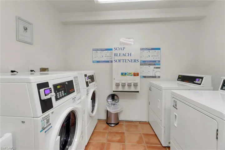 Shared laundry featuring washing machine and dryer
