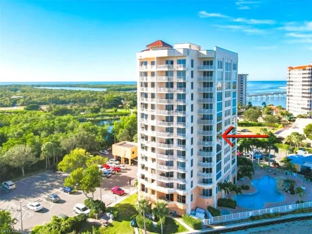 View of  building / complex with a water view