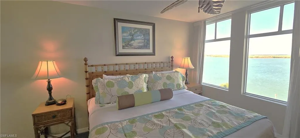 Bedroom with a water view