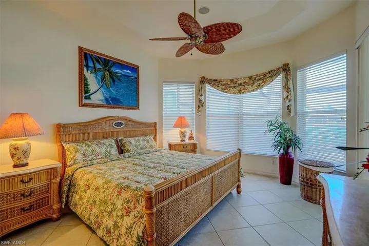 Bedroom featuring ceiling fan and light tile patterned floors