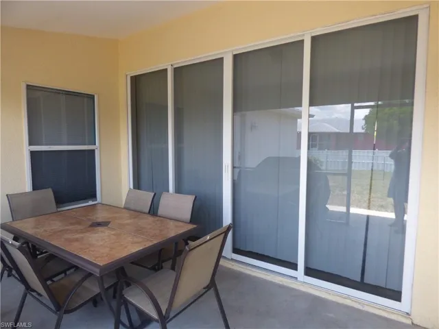 Sliders from living room & master bedroom open to the patio and fenced backyard
