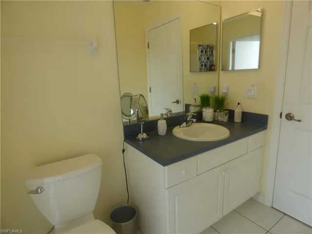 Bathroom with tile floors and vanity!