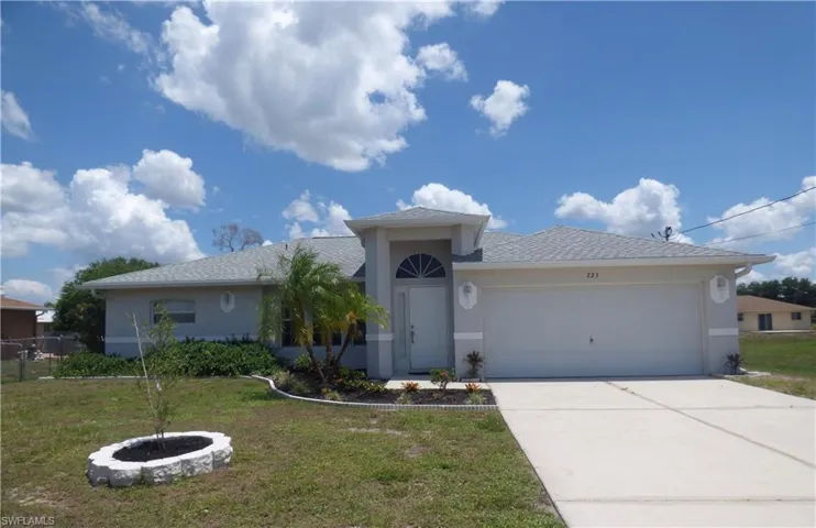 View of front of home with 2 car garage