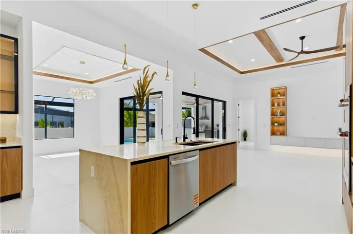 Open to the great room and dining area, this stunning space blends modern elegance with everyday convenience