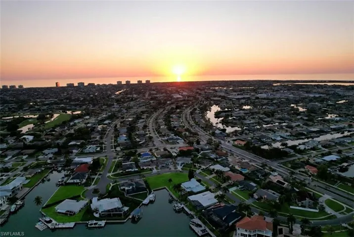 View of urban area with a large body of water and nearby suburban area