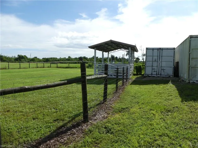 View of yard and an outdoor structure