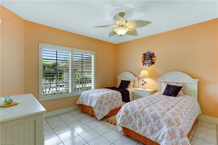 Guest bedroom with Plantation Shutters.