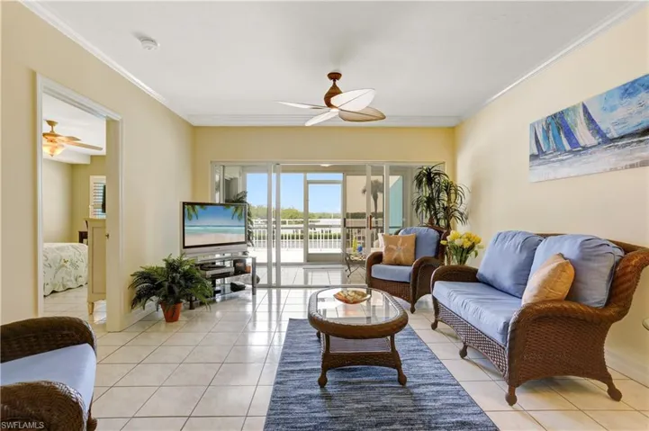 Spacious Great Room with views of the bay from the sliders and balcony.