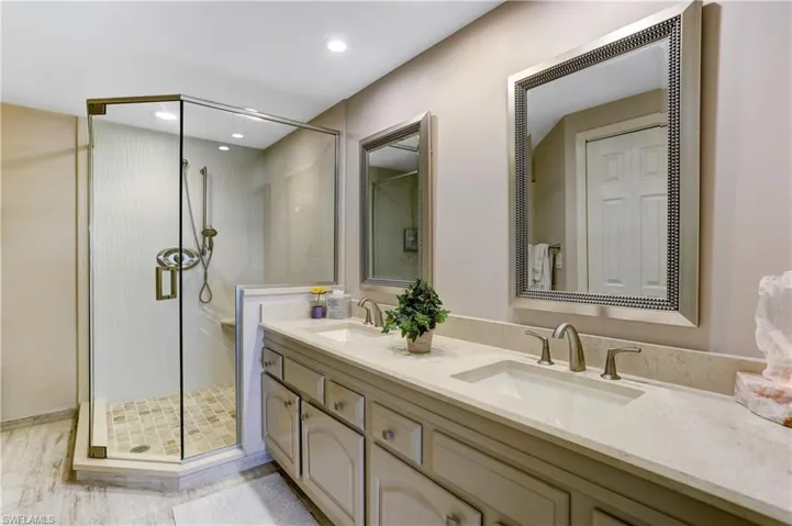 Quartz counters, double sinks, brand new shower.