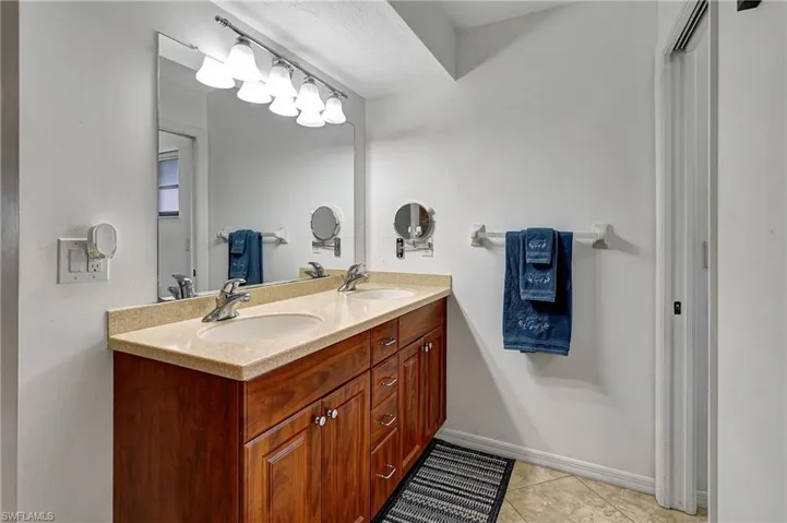 Spacious walk in closet and double vanity sinks
