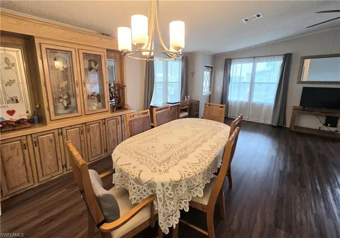 Built-in cabinetry in the Dining Room offers so much storage space!