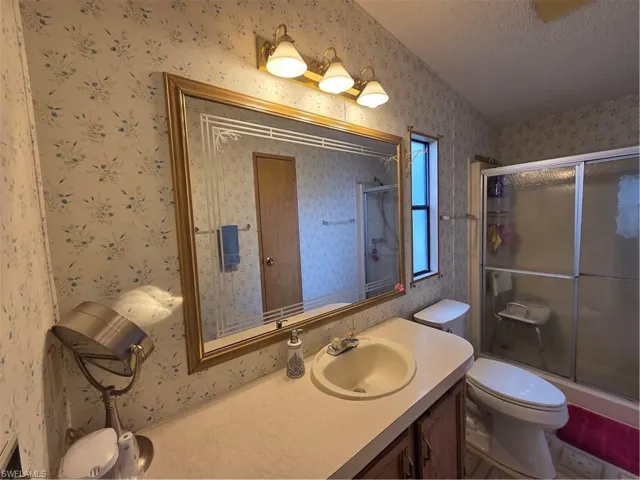 Primary Bathroom has a convenient walk-in shower.