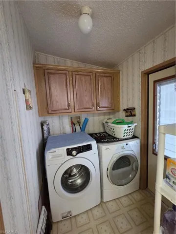 Laundry room conveniently located off the Kitchen. All appliances convey.