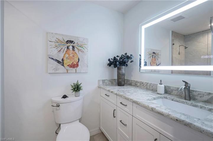 Spacious guest bathroom.