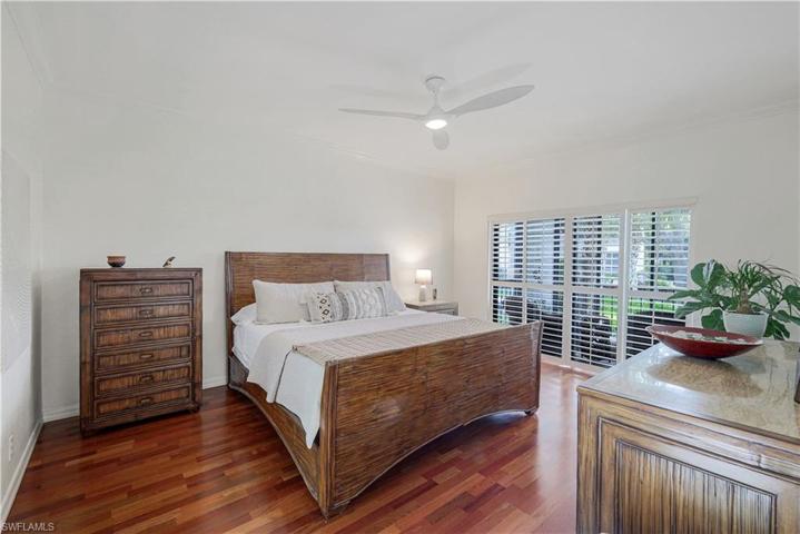 Primary bedroom, overlooking the lake, with so much natural light.