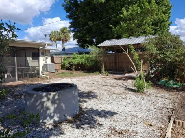 View of yard with central AC unit