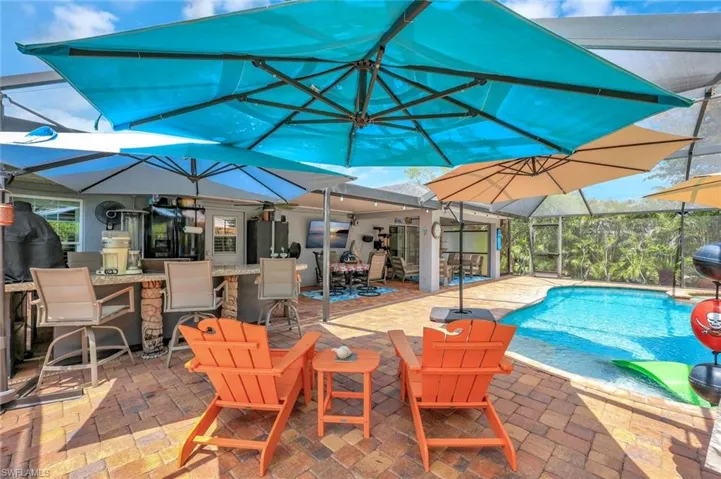 Outdoor pool with a patio area