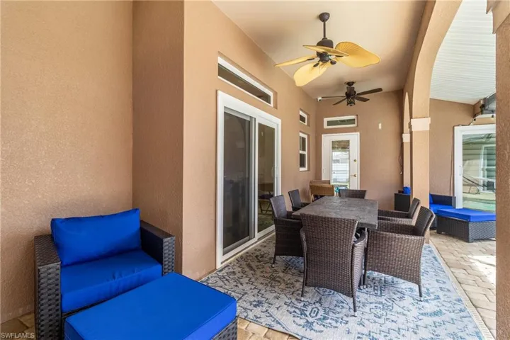 View of patio / terrace with ceiling fan and outdoor dining space