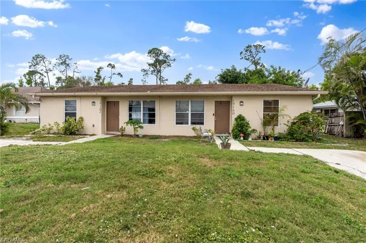 Single story home featuring a front yard
