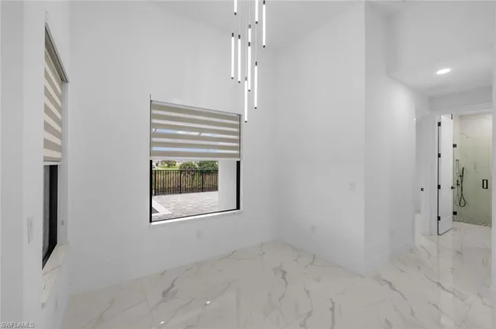 Unfurnished room with tile patterned floors