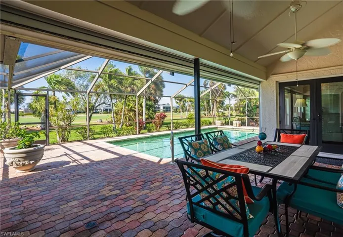 View of pool & enclosed Lanai
