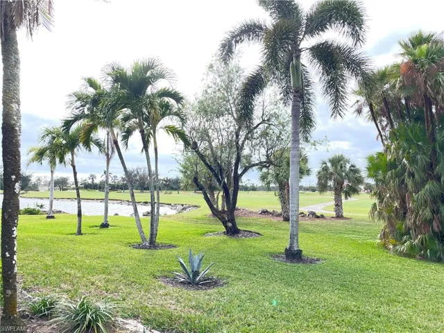 View of yard with a water view
