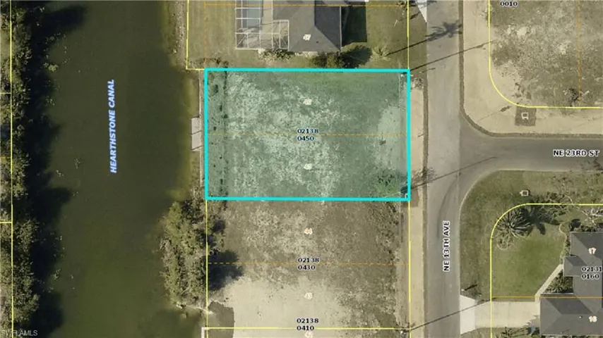 Aerial view of property's location with property parcel outlined