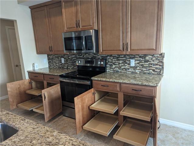 Slideout shelving in kitchen cabinets!