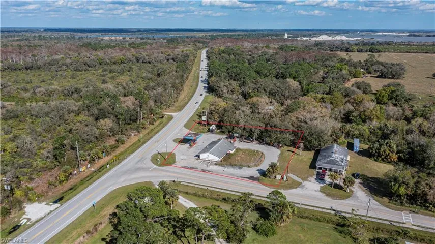 Drone / aerial view with a wooded view