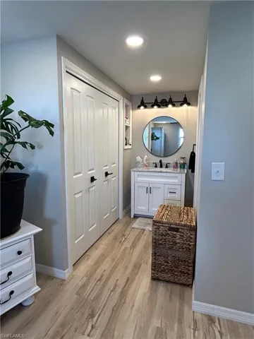 Bathroom featuring hardwood / wood-style floors and vanity