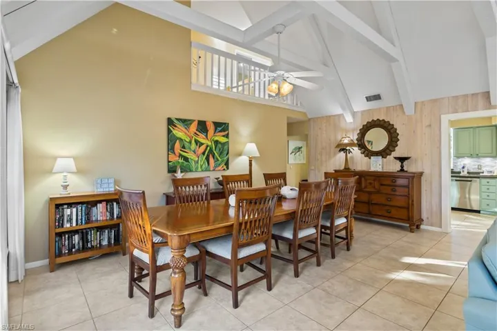 Beautiful Tommy Bahama set with re-upholstered chairs seats 8