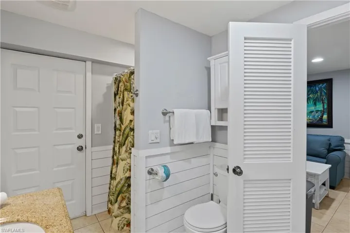 Bathroom featuring sink, tile patterned flooring.
