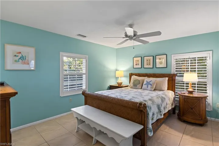 Bedroom featuring ceiling fan and light tile patterned floors