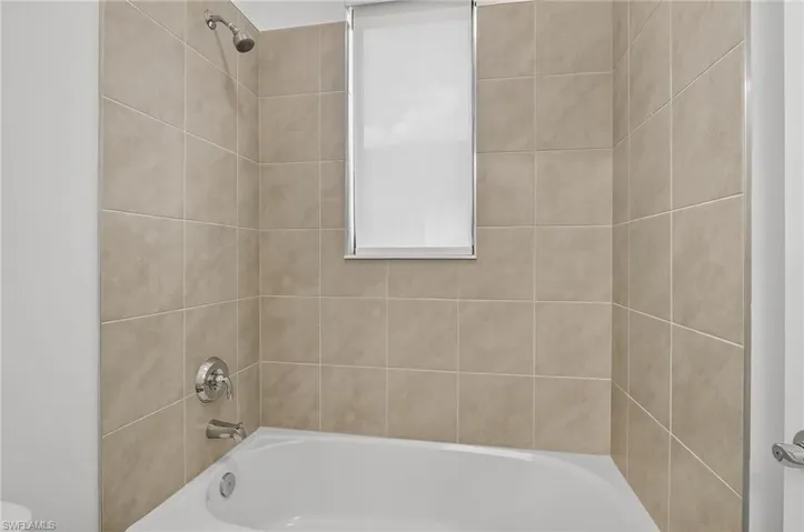 Bathroom featuring shower / tub combination