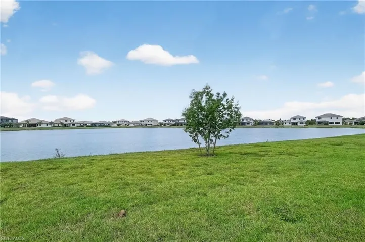 Water view featuring nearby suburban area