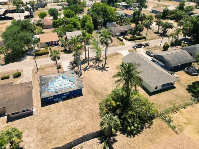 Birds eye view of property with a residential view