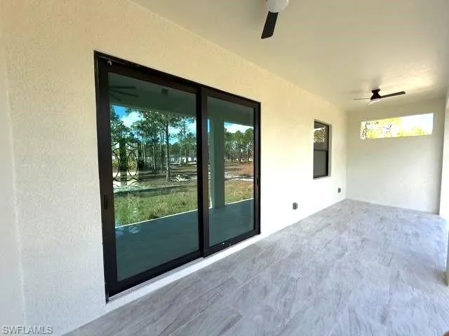 View of patio / terrace featuring a ceiling fan