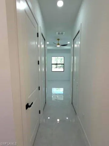 Corridor with recessed lighting