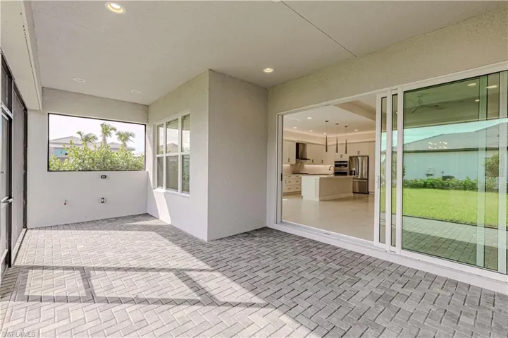 View of patio featuring an outdoor kitchen