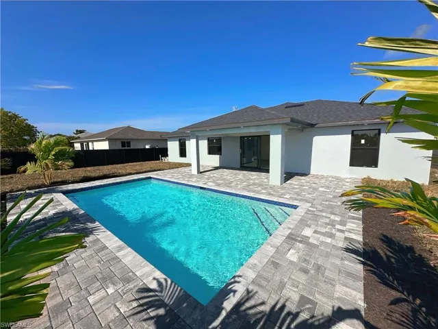 View of swimming pool with a patio