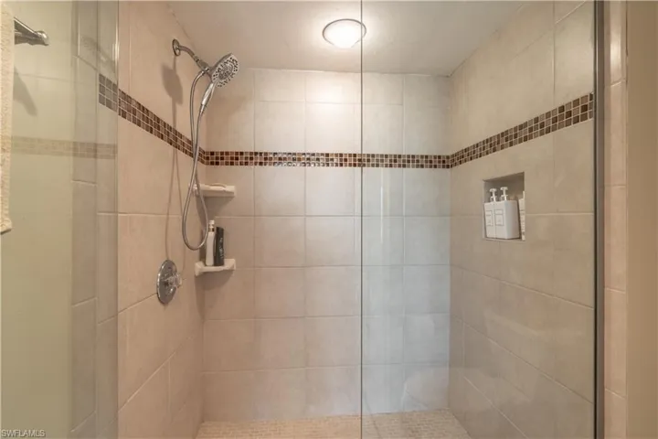 Primary bathroom featuring an enclosed shower