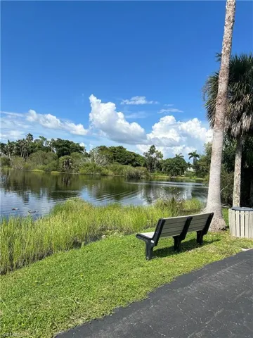 View of walking trail with bench to sit and enjoy the view