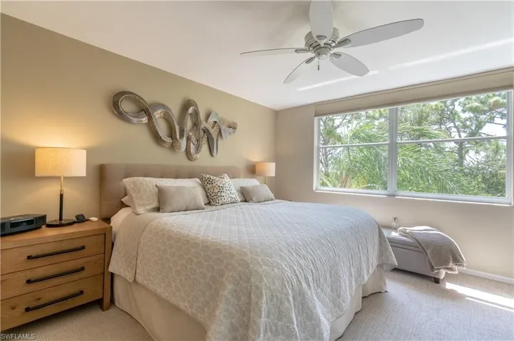 Primary bedroom with view out to preserve