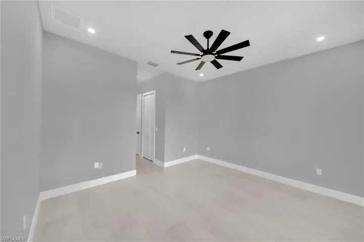 Spare room featuring recessed lighting and ceiling fan