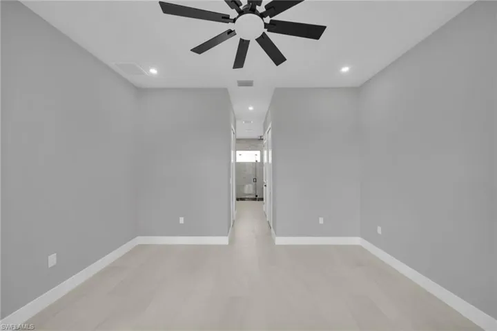 Unfurnished room with recessed lighting and ceiling fan