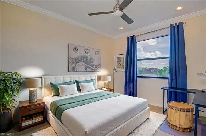 Bedroom with crown molding, recessed lighting, and ceiling fan