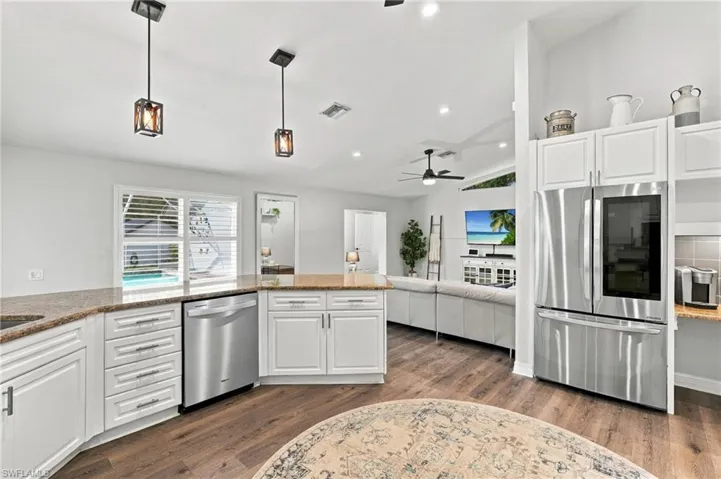 Stainless steel appliances throughout the kitchen