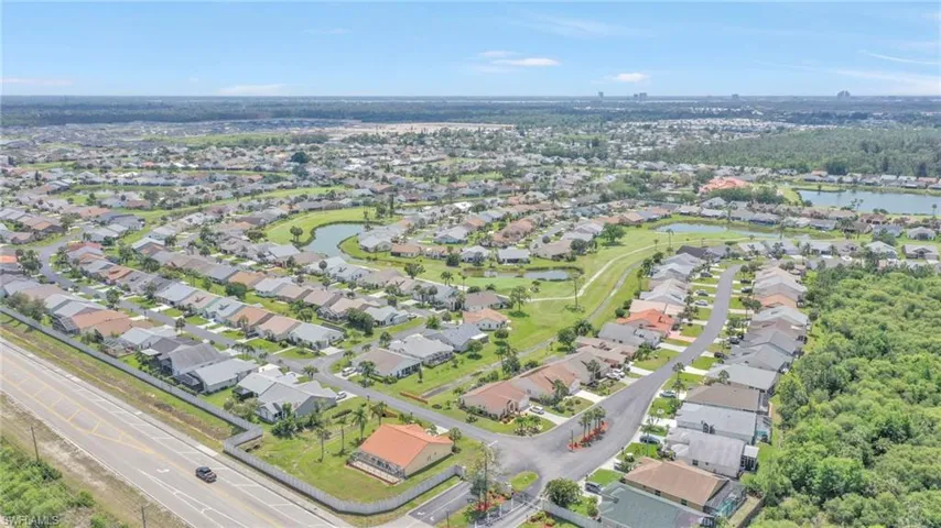 Bird's eye view featuring a water view and a residential view