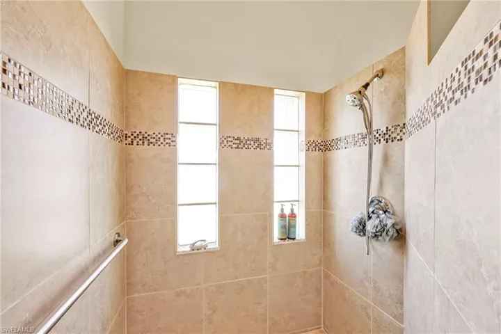 Bathroom with a tile shower