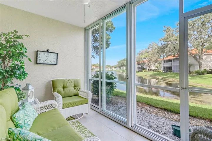 Screened lanai with  trifold sliding glass doors